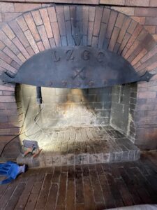 Firebox back wall rebuild in progress - firebox repair service by Midwest Chimney Specialists