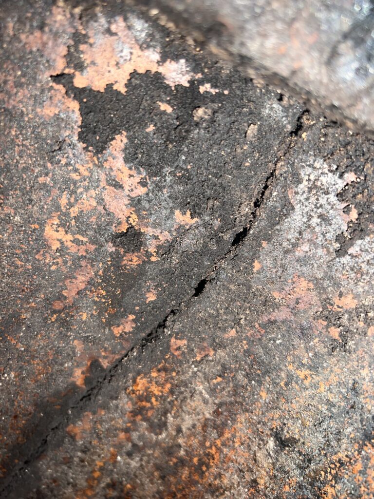 Level 2 chimney inspection revealing vertical crack in chimney lining - fire damage inspection in Chicago, IL