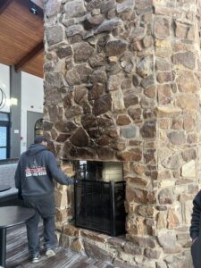 Chimney inspection revealing smoke, carbon monoxide risk and fire hazard - safety inspection in Chicagoland