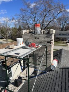 Chimney masonry repair with brick replacement and crown rebuild - Oakbrook Terrace, IL