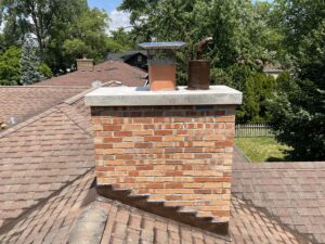 Chimney after full rebuild - restored brick chimney by Midwest Chimney Specialists, Oakbrook Terrace IL