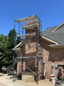 Scaffold set up for chimney rebuild - safe access rigging for chimney restoration in Chicago, IL