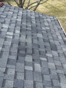 Chimney removal with roof repair and shingle replacement - roofline restoration in Chicago suburb home