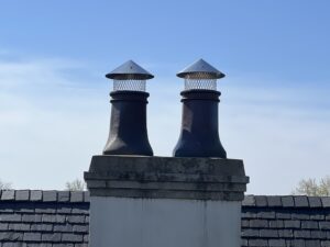 Custom chimney rain cover and pot toppers installed - chimney cap and cover service in Chicago, IL