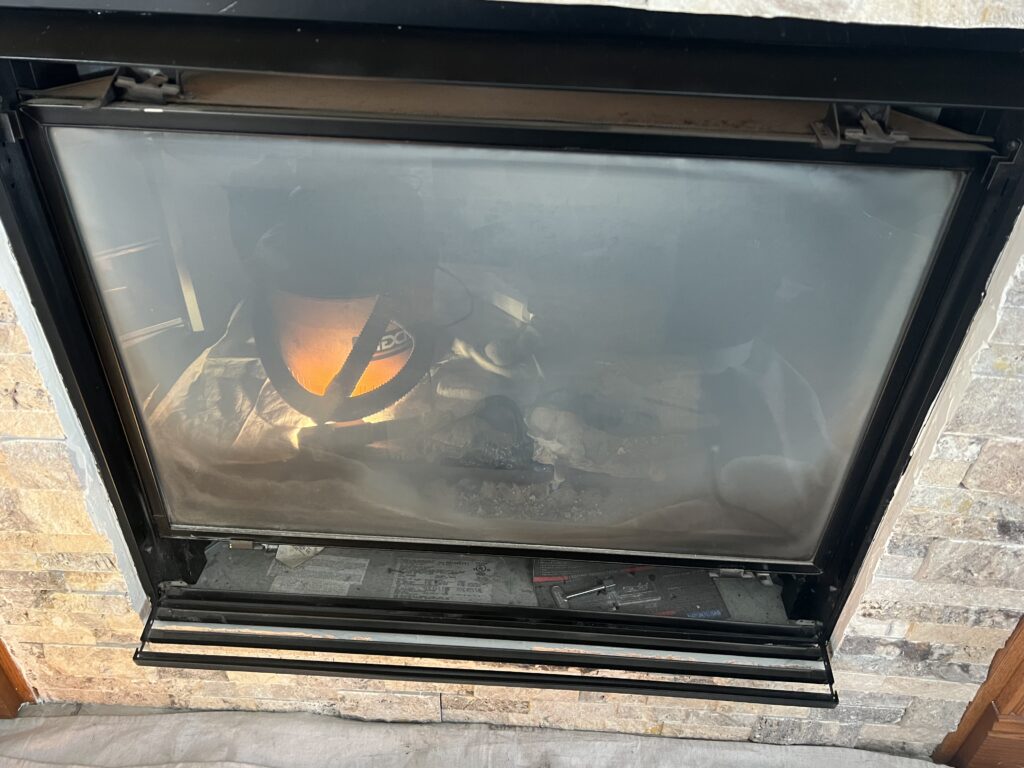 Direct vent gas log before refurbishment - gas fireplace repair and tune-up service in Chicagoland