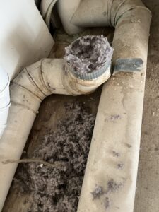Dryer vent blockage cleared in HOA multi-unit property - fire hazard prevention service in Chicago suburbs