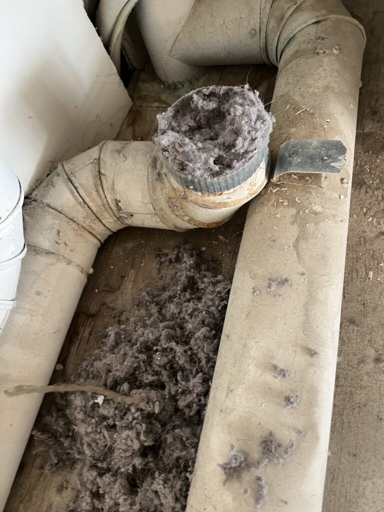 Dryer vent blockage cleared in HOA multi-unit property - fire hazard prevention service in Chicago suburbs