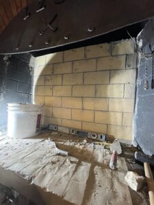 Completed firebox back wall rebuild - masonry repair and firebox restoration by Midwest Chimney Specialists
