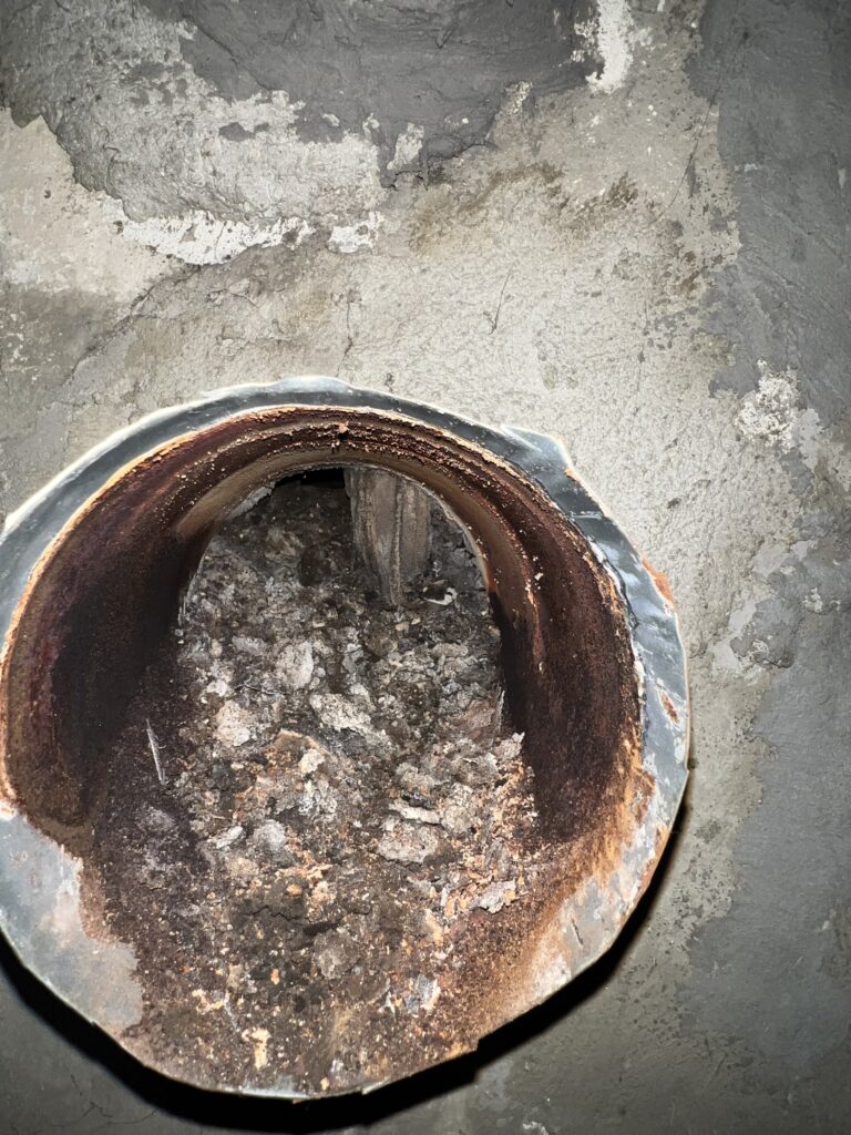 Blocked furnace flue creating carbon monoxide risk - flue cleaning and safety inspection in Chicago, IL