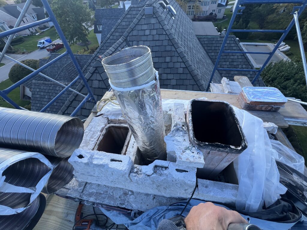 Lightning strike damaging chimney liner and causing water intrusion fire hazard - Level 3 inspection in Chicagoland