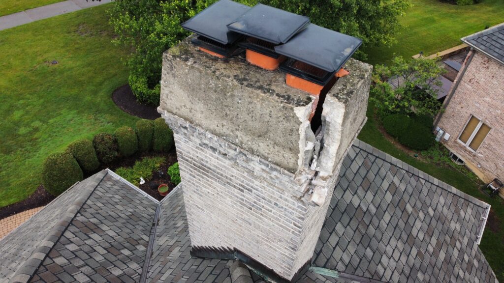 Lightning bolt strike causing chimney damage - emergency chimney inspection and repair in Chicago suburbs