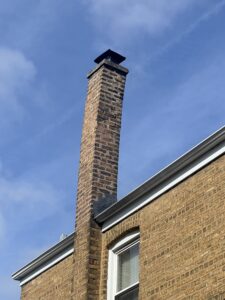 Leaning chimney with structural integrity failure - chimney rebuild needed on Chicago area home