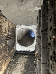 Wood-burning fireplace smoke chamber fire hazard identified - latent defect inspection and repair in Chicago suburbs