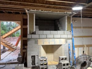 Custom modified Rumford wood-burning fireplace in new construction - masonry build by Midwest Chimney Specialists