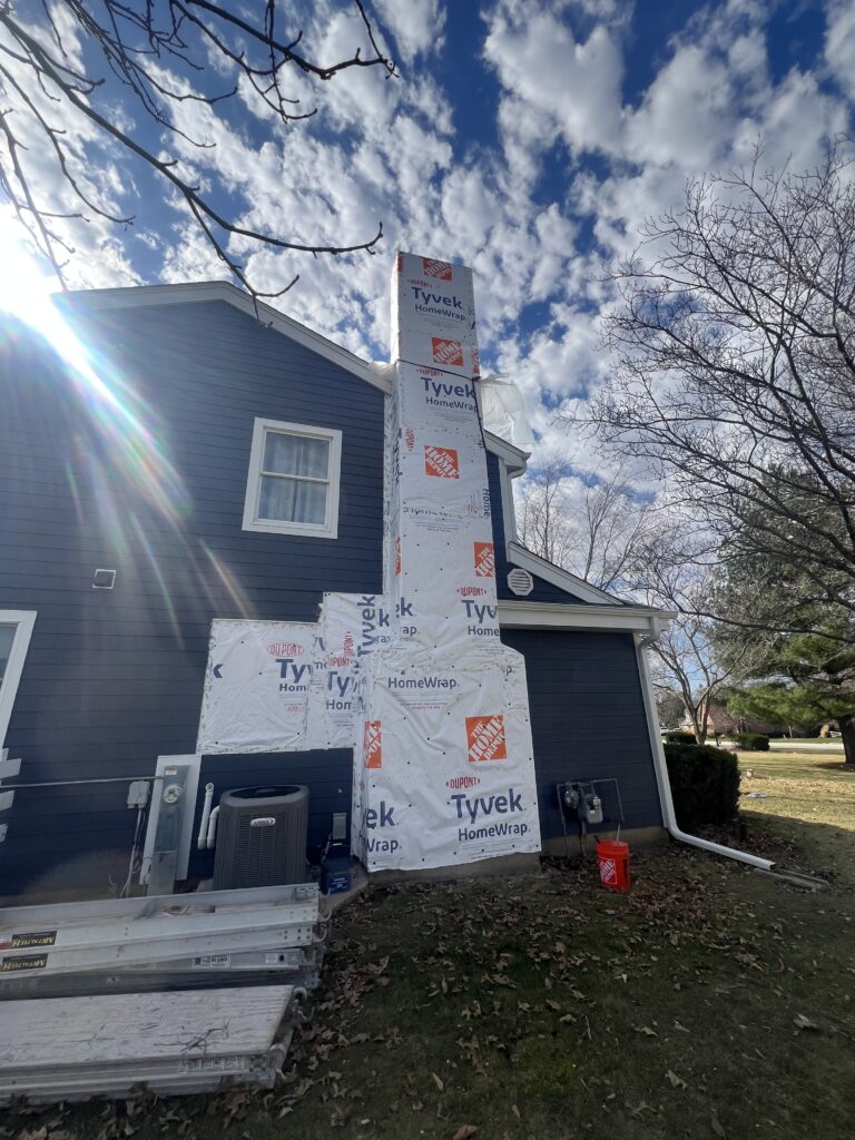 Chimney fire damage on new construction - full chimney rebuild by Midwest Chimney Specialists, Chicagoland