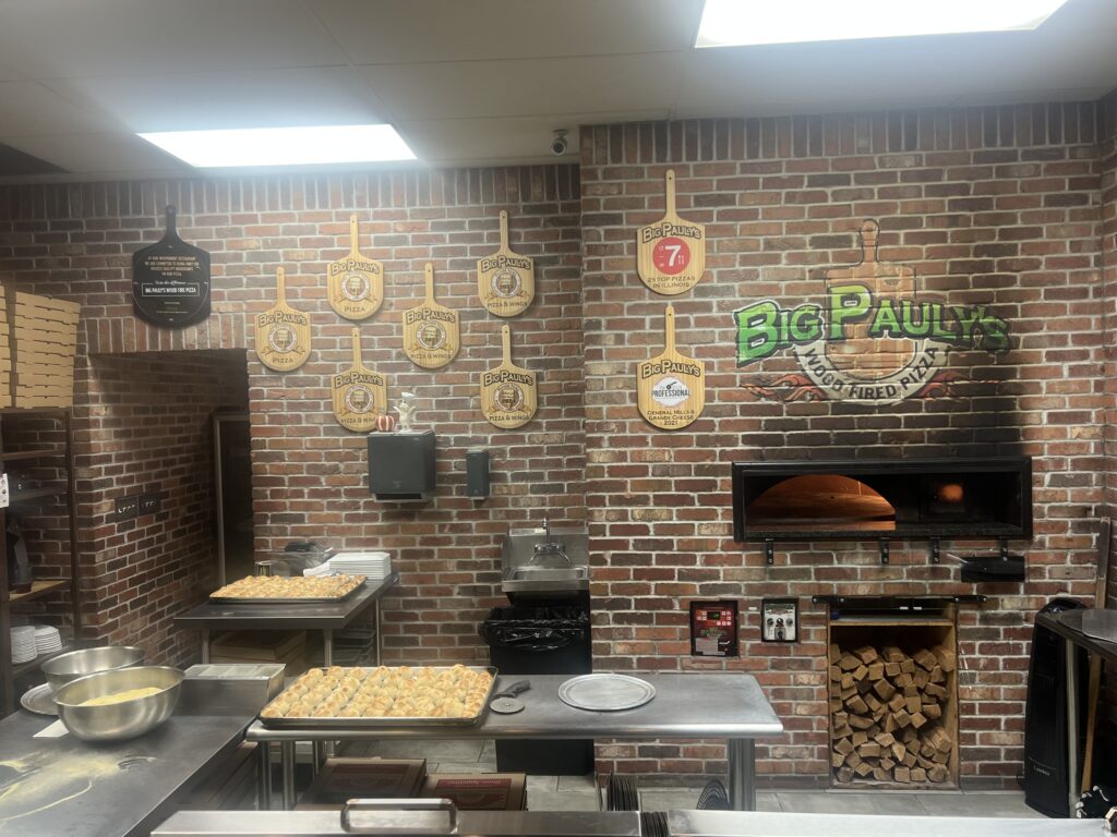 Wood-fired pizza oven cleaning and inspection at Chicago area restaurant - commercial exhaust cleaning service